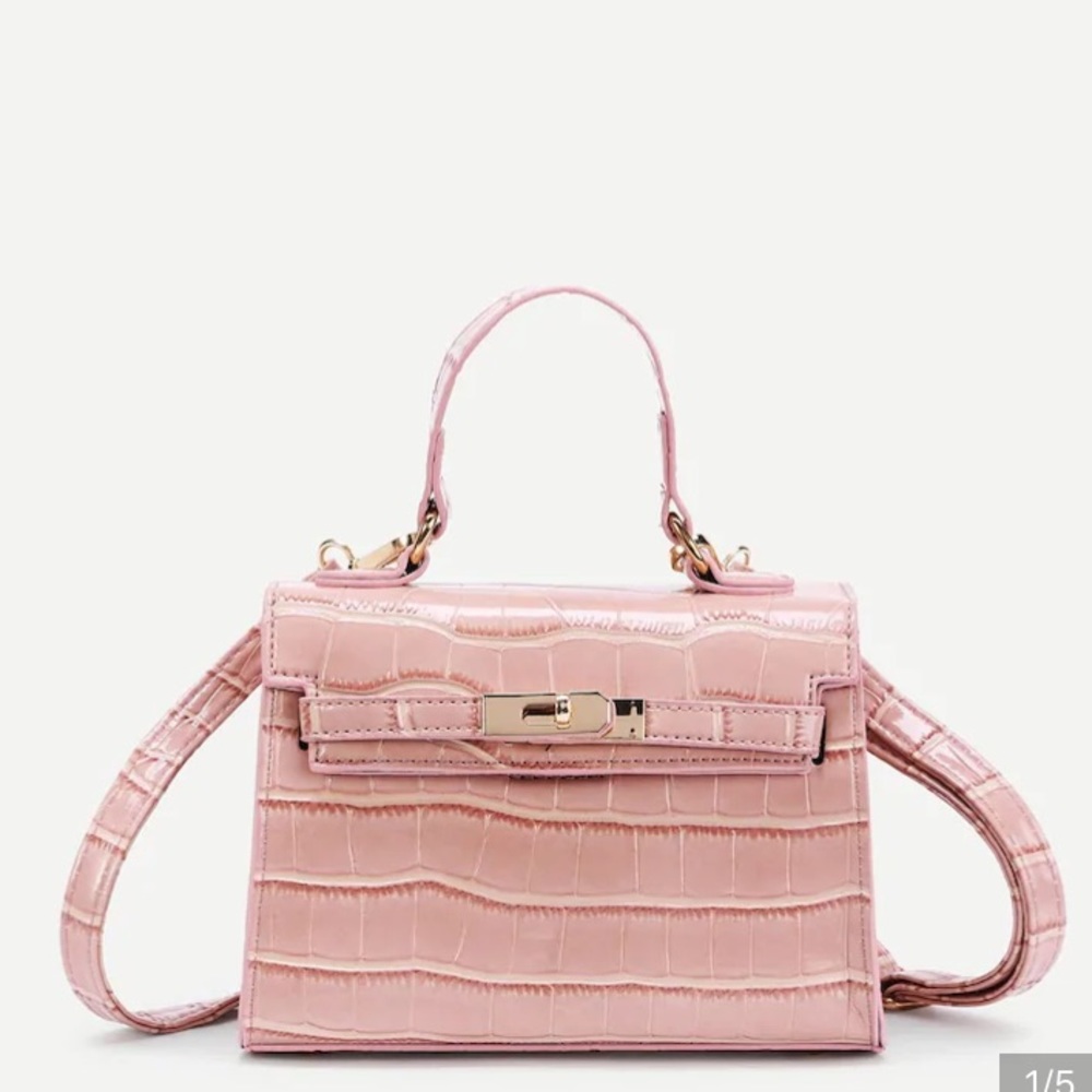 Pink faux crocodile skin purse